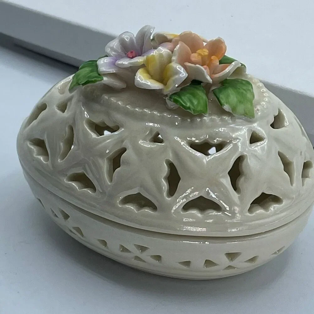 Vintage Cream Lusterware floral cut out design Easter Egg trinket box.